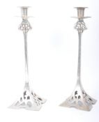 PAIR OF EARLY 20TH CENTURY ART NOUVEAU CANDLESTICK HOLDERS