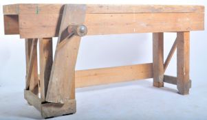 LARGE MID TWENTIETH CENTURY INDUSTRIAL PINE WORKBENCH