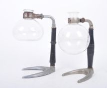 RETRO TWENTIETH CENTURY CONA BEAKERS ON IRON STANDS