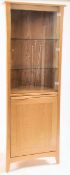 CONTEMPORARY ERCOL LIGHT OAK GLAZED CORNER CABINET