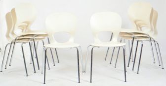 EIGHT CONTEMPORARY FORMED PLASTIC & CHROME DINING CHAIRS