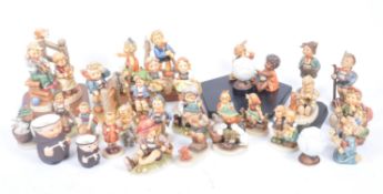 M. J. HUMMEL BY GOEBEL - LARGE COLLECTION OF PORCELAIN FIGURINES