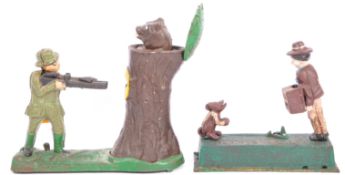 TWO VINTAGE 20TH CAST IRON SPRING LOADED MONEY BOXES