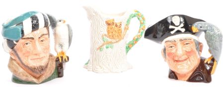 PAIR OF ROYAL DOULTON TOBY JUGS WITH CLARICE CLIFF JUG