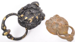 TWO EARLY 20TH CENTURY CAST IRON & BRASS LIONHEAD DOOR KNOCKERS