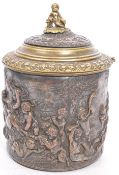 LATE 19TH CENTURY BRASS & COPPER EMBOSSED TOBACCO JAR
