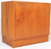 A LATE 20TH CENTURY TEAK SIDEBOARD ON A PLINTH BASE