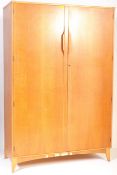 A 1960 MID CENTURY TEAK VENEER WARDROBE BY GOLDEN KEY