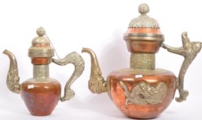 PAIR OF EARLY 20TH CENTURY TIBETAN BRASS & COPPER TEA POTS