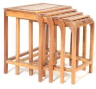 20TH CENTURY ARTS & CRAFTS INSPIRED NEST OF TABLES