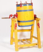19TH CENTURY YELLOW PAINTED WOODEN BUTTER CHURN ON STAND