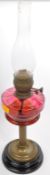 19TH CENTURY CRANBERRY GLASS AND BRASS OIL LAMP