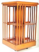 REPRODUCTION YEW WOOD INLAID REVOLVING BOOKCASE