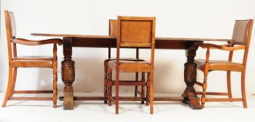 20TH CENTURY JACOBEAN REVIVAL OAK DINING TABLE WITH CHAIRS