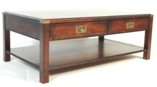 A CONTEMPORARY MAHOGANY STYLE COFFEE TABLE
