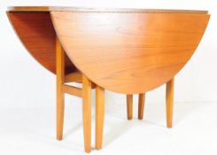 MID CENTURY TEAK SPACE SAVER GATELEG TEAK DINING TABLE