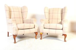 PAIR OF 20TH CENTURY UPHOLSTERED WING BACK ARMCHAIRS