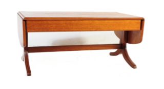 A MID 20TH CENTURY TEAK DROP LEAF COFFEE TABLE