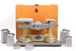 FOUR MID CENTURY GUARDIAN BABY SCALES IN CASE