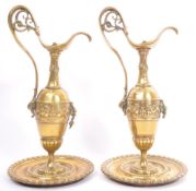 PAIR OF 19TH CENTURY BRASS DECORATIVE JUGS