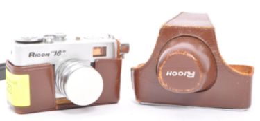 A VINTAGE RICOH 16 MINI MINIATURE SPY CAMERA WITH CASE & LENS