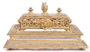 A 19TH CENTURY VICTORIAN BRASS DESK TIDY / INK WELL