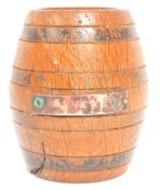 An H.M.S VICTORY MINIATURE SOUVENIR RUM BARREL ZINC NAME PLATE