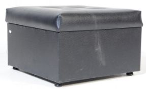 A VINTAGE RETRO SQUARE BLACK VINYL FOOT STOOL POUF
