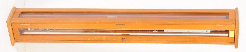 A MID CENTURY SHIPS MARINE STICK BAROMETER TEAK CASED