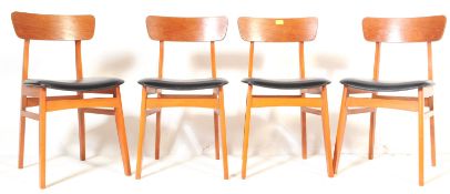 FOUR VINTAGE MID CENTURY TEAK & VINYL DINING CHAIRS