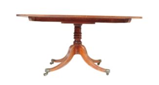 A GEORGE III MAHOGANY PEDESTAL DINING TABLE