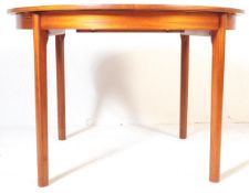A RETRO VINTAGE TEAK WOOD EXTENDING TABLE BY MACINTOSH