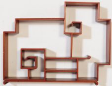 A MID 20TH CENTURY CHINESE MAHOGANY OPEN WALL SHELF