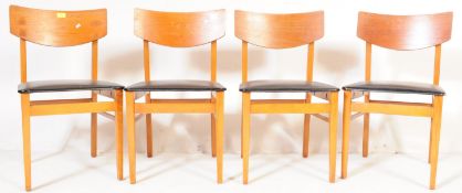 FOUR MID 20TH CENTURY TEAK & BLACK VINYL DINING CHAIRS