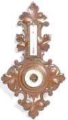 20TH CENTURY BLACK FOREST CARVED OAK BAROMETER