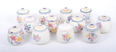 POOLE POTTERY - TWELVE VINTAGE 20TH CENTURY LIDDED POTS