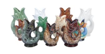 COLLECTION OF ELEVEN RETRO MIDCENTURY GLUGGLE JUGS