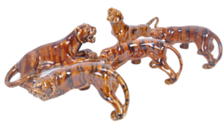 COLLECTION OF FIVE 20TH CENTURY CERAMIC PROWLING TIGERS
