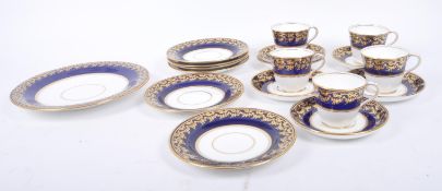 TWENTIETH CENTURY BONE CHINA TEA SERVICE IN COBALT & GOLD