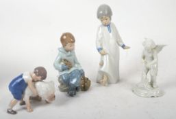 COLLECTION OF FOUR CONTINENTAL PORCELAIN FIGURINES