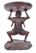 20TH CENTURY HARDWOOD CHINESE TABLE STAND OF FIGURED MAN