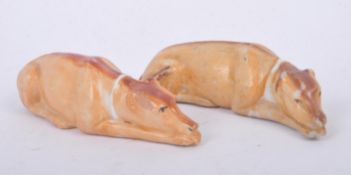 TWO LATE VICTORIAN STAFFORDSHIRE GREYHOUNDS