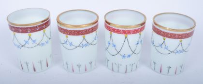 FOUR 20TH CENTURY ENAMEL BOHEMIAN STYLE TEALIGHT HOLDERS