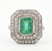 PLATINUM EMERALD & DIAMOND HALO RING