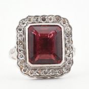18CT WHITE GOLD PINK TOURMALINE & DIAMOND HALO RING
