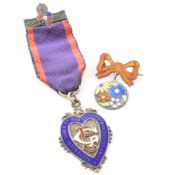 TWO SILVER & ENAMEL BROOCH PINS