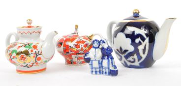COLLECTION OF RUSSIAN MADE IN USSR TEAPOTS AND FIGURINE