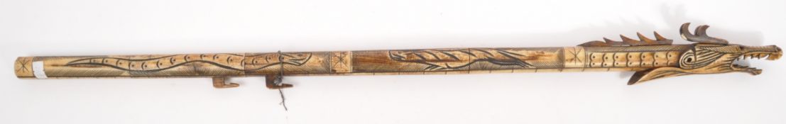 20TH CENTURY CARVED BONE ORIENTAL DRAGON BLOWPIPE