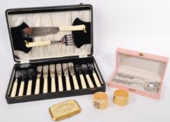 A CASED SHEFFIELD STAINLESS SET OF FISH KNIVES FORKS ETC.