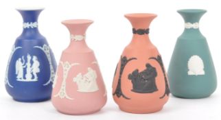 FOUR WEDGWOOD JASPERWARE BUD VASES - TEAL - TERRACOTTA - PINK